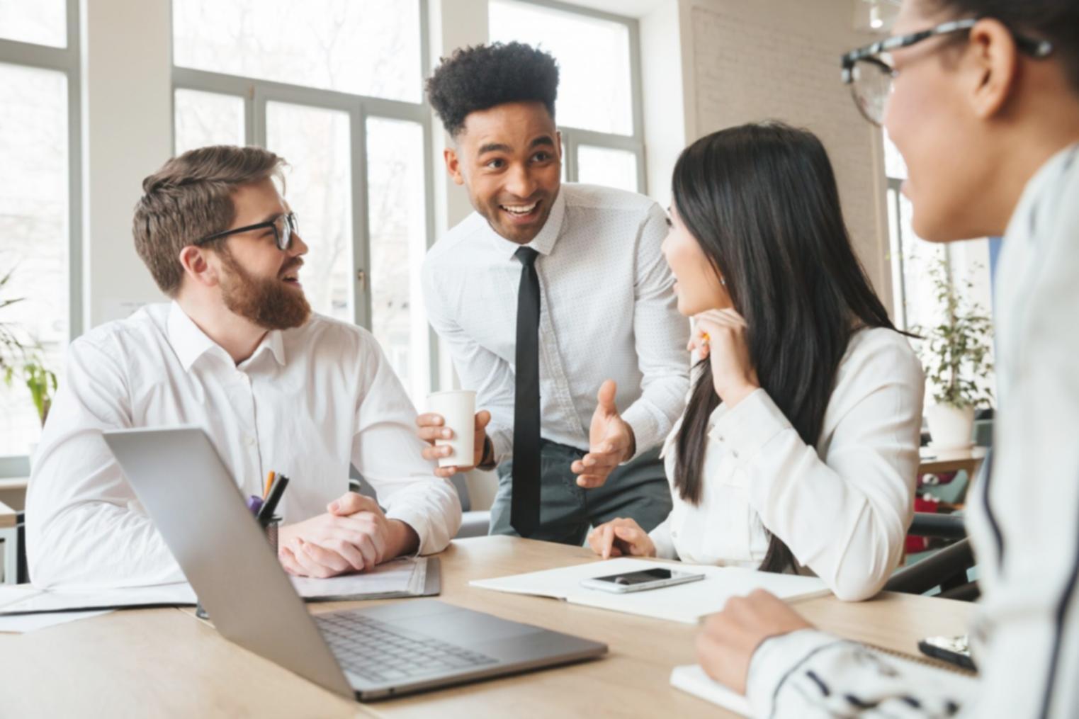 Financial planning workspace with documents and laptop in Newcastle office
